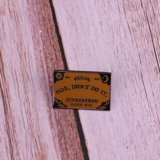 Hoe Don't Do It Ouija Board Enamel Pin